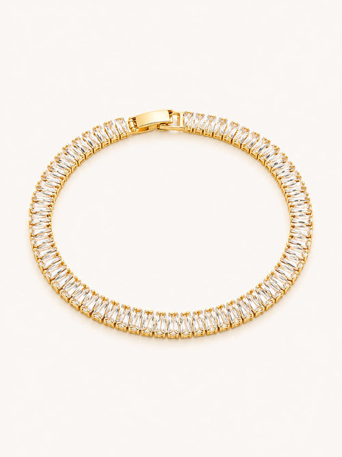 Gold baguette CZ tennis bracelet with an elegant continuous stone design.