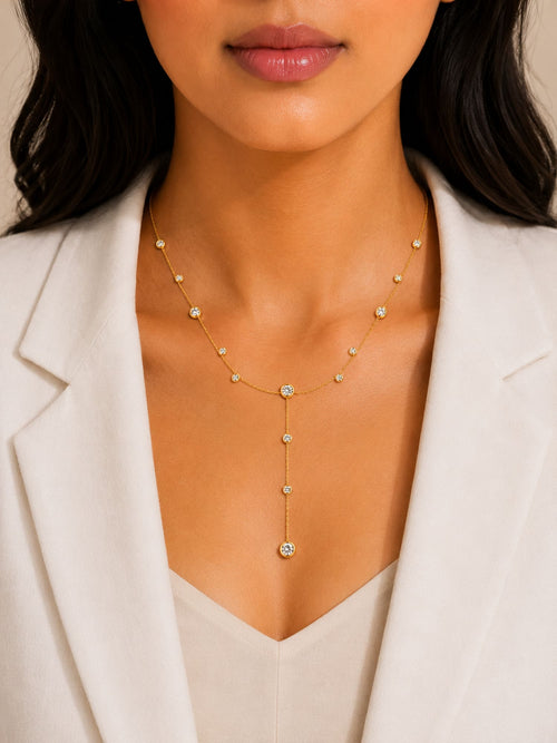 Minimalist bezel CZ Y-drop necklace close up model photography