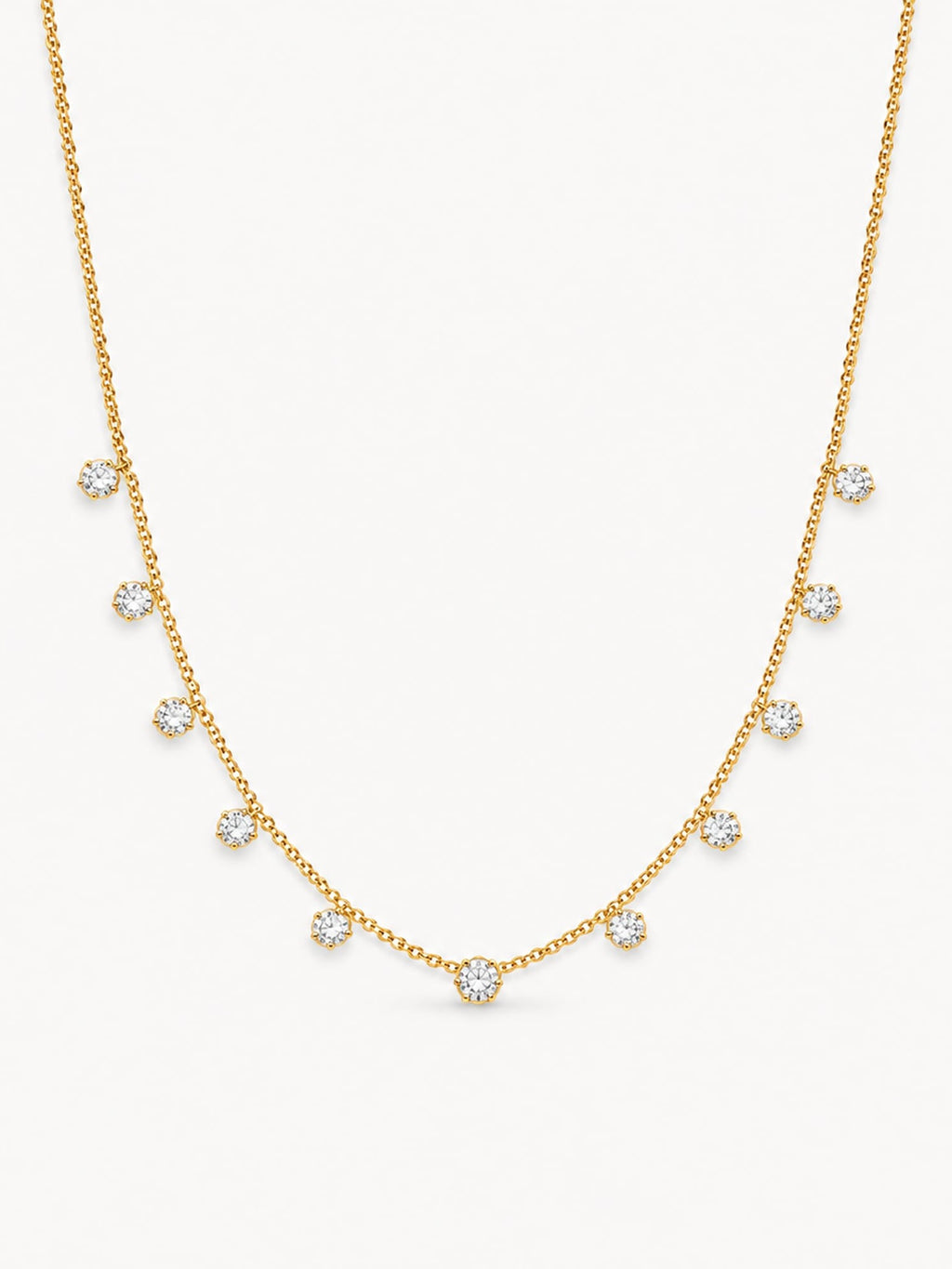 Dainty round CZ station necklace in 18K gold plated stainless steel with evenly spaced sparkling stones.