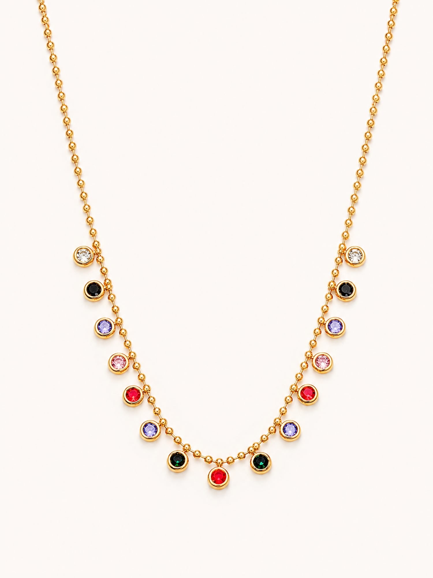 18K gold plated multicolor bezel station necklace with colorful crystal accents on white background
