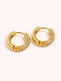 Gold pavé huggie hoop earrings featuring clear cubic zirconia set in premium stainless steel.